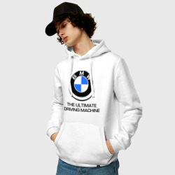 Толстовка с принтом BMW Driving Machine для мужчины, вид на модели спереди №2. Цвет основы: белый