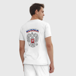 Пижама с принтом Russia герб двусторонняя для мужчины, вид на модели сзади №2. Цвет основы: белый