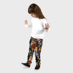 Детские брюки 3D Разноцветные заплатки пэчворк черно оранжевого цвета  - фото 2