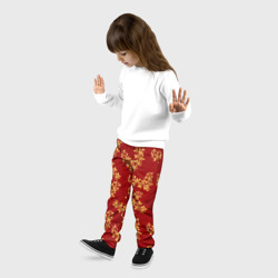 Детские брюки 3D Золотые веточки на ярко красном фоне - фото 2