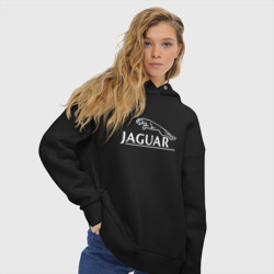 Худи с принтом Jaguar, Ягуар Логотип для женщины, вид на модели спереди №3. Цвет основы: черный