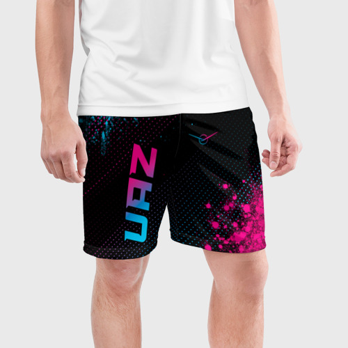 Мужские шорты спортивные с принтом UAZ - neon gradient: символ и надпись вертикально, фото на моделе #1