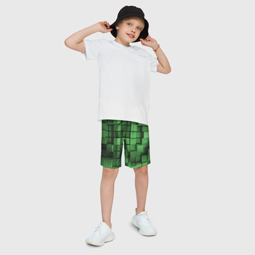 Детские спортивные шорты 3D с принтом Киберпанк броня - зелёные металлические кубы, фото на моделе #1