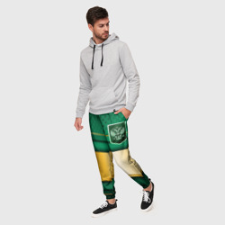 Мужские брюки 3D Герб России на зеленой абстракции - фото 2