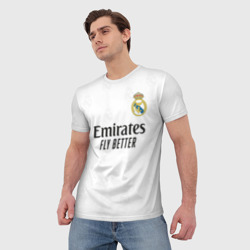 Футболка с принтом Винисиус Реал Мадрид форма 2022-2023 для мужчины, вид на модели спереди №2. Цвет основы: белый