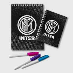 Блокнот Inter с потертостями на темном фоне