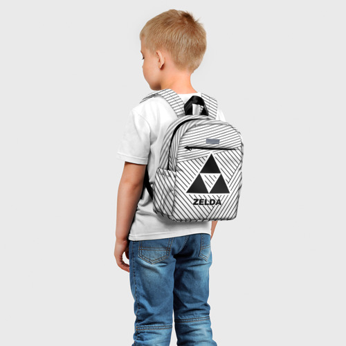 Детский рюкзак 3D с принтом Символ Zelda на светлом фоне с полосами, фото на моделе #1