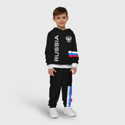 Костюм с принтом Россия и три линии на черном фоне для ребенка, вид на модели спереди №2. Цвет основы: белый