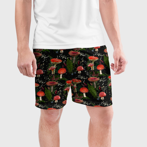 Мужские шорты спортивные с принтом Мухоморы и лесные ягоды на черном фоне, фото на моделе #1