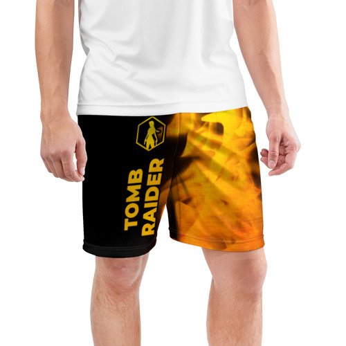 Мужские шорты спортивные с принтом Tomb Raider - gold gradient: по-вертикали, фото на моделе #1