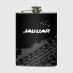 Фляга Jaguar Speed на темном фоне со следами шин: символ сверху