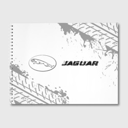 Альбом для рисования Jaguar Speed на светлом фоне со следами шин: надпись и символ