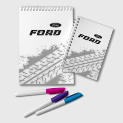 Блокнот Ford Speed на светлом фоне со следами шин: символ сверху