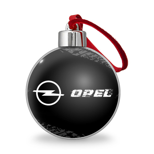 Ёлочный шар Opel Speed на темном фоне со следами шин: надпись и символ