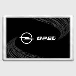 Магнит 45*70 Opel Speed на темном фоне со следами шин: надпись и символ