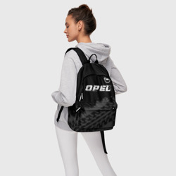 Рюкзак с принтом Opel speed на темном фоне со следами шин: символ сверху для любого человека, вид спереди №4. Цвет основы: белый