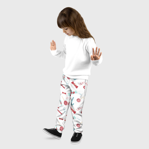 Детские брюки 3D с принтом Новогодние конфетки и подарки, фото на моделе #1