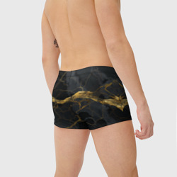 Плавки с принтом Золотое напыление на черной абстракции для мужчины, вид на модели сзади №2. Цвет основы: белый