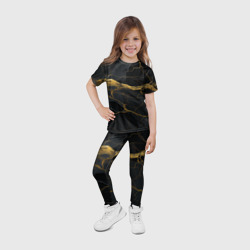 Леггинсы с принтом Золотое напыление на черной абстракции для ребенка, вид на модели спереди №4. Цвет основы: белый