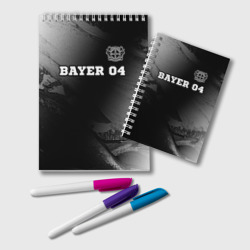 Блокнот Bayer 04 sport на темном фоне посередине