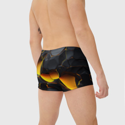 Плавки с принтом Разлом черных плит и оранжевая лава для мужчины, вид на модели сзади №2. Цвет основы: белый
