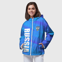 Ветровка с принтом Россия - синие волны для женщины, вид на модели спереди №2. Цвет основы: белый