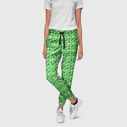 Белые плюсики на зелёном фоне – Женские брюки 3D с принтом купить