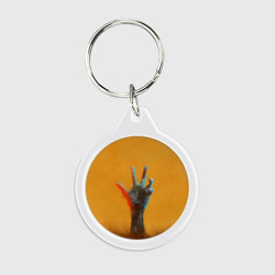 Брелок круглый Рука зомби